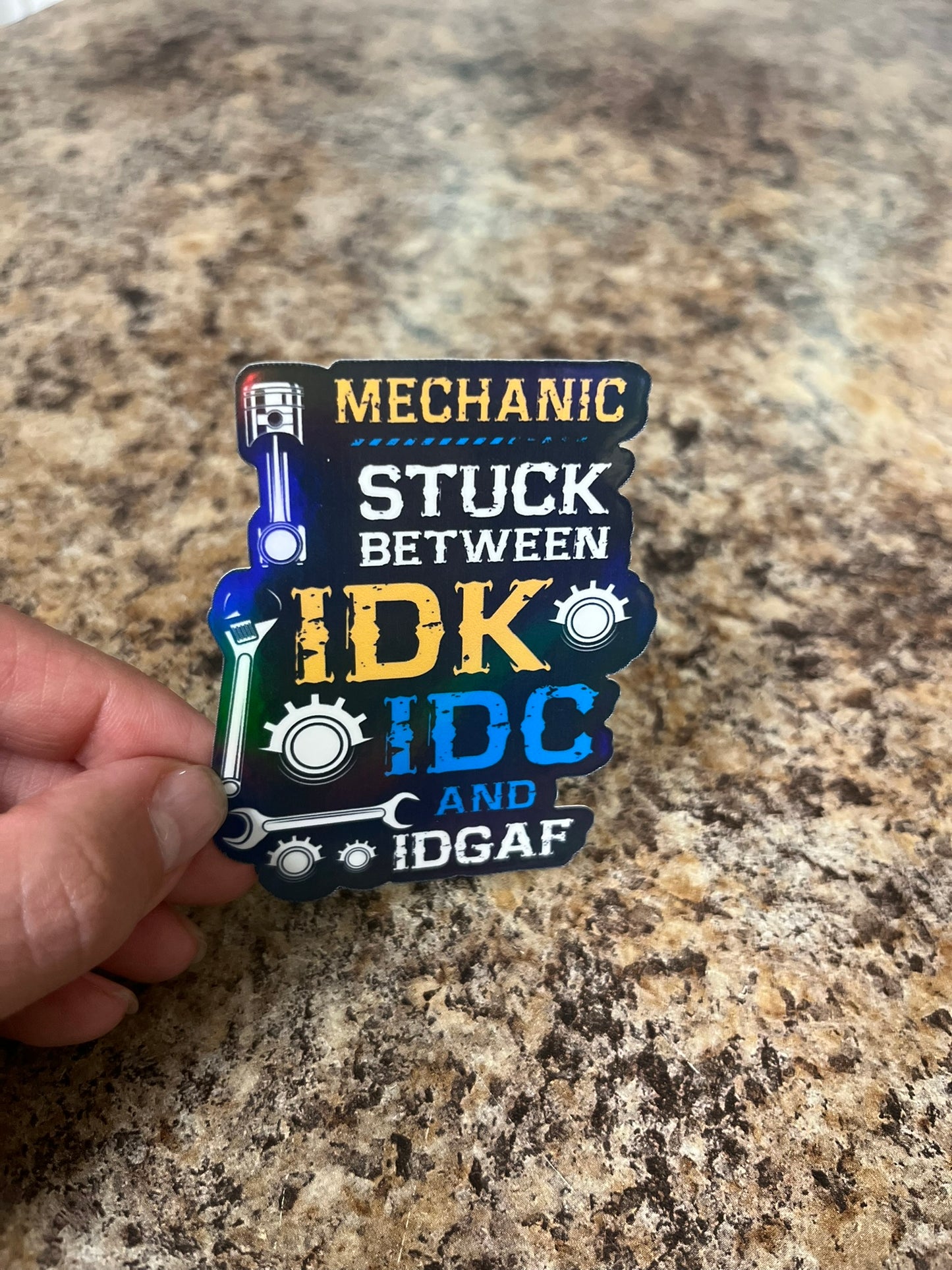 Mechanic Stuck Between Waterproof Sticker | Funny Tool Vinyl | 4 Size & Finish Options | Laptop Yeti Stanley Cooler+