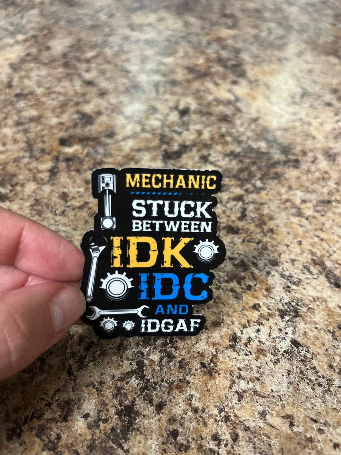 Mechanic Stuck Between Waterproof Sticker | Funny Tool Vinyl | 4 Size & Finish Options | Laptop Yeti Stanley Cooler+