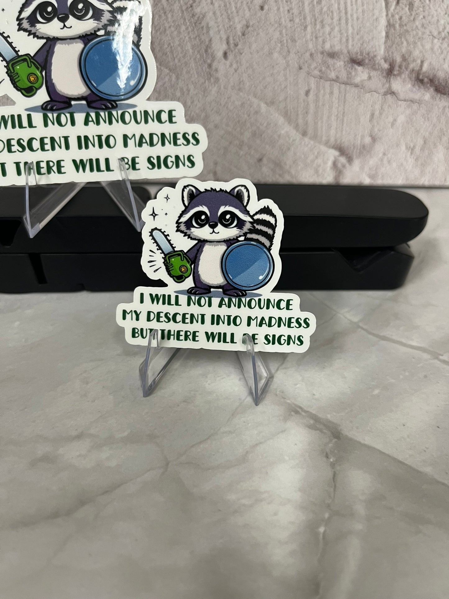 Raccoon DESCENT into Madness Signs Waterproof Sticker | Chainsaw Humor Vinyl | 2 Size Options | Laptop Yeti Stanley Cooler+ Trash Panda